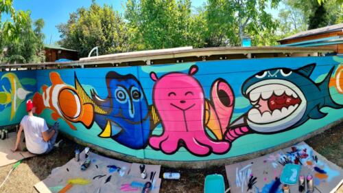 commissiona un murales a milano e in italia